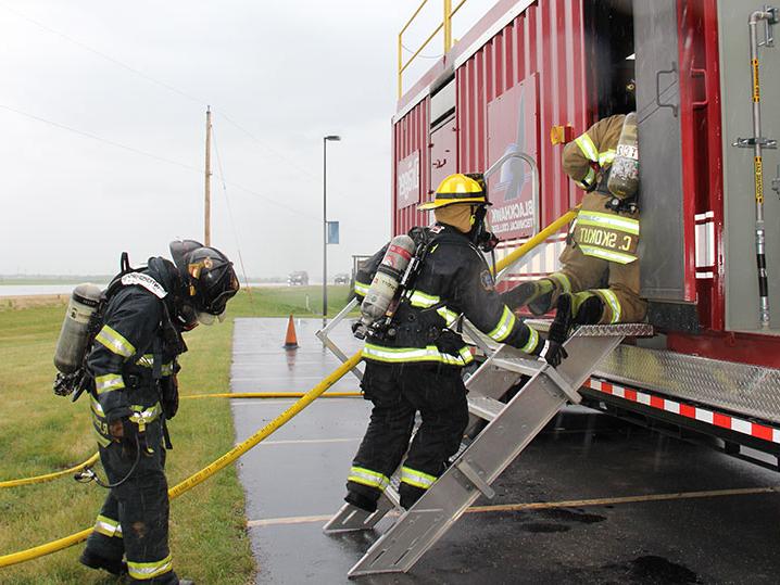 firefighter students training outside